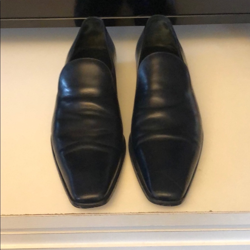 Ferragamo black leather slip ons